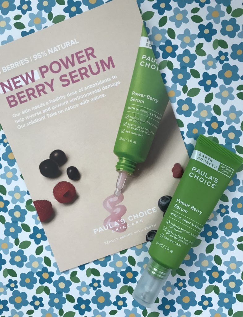 Paula's Choice Power Berry Serum in bright green tube along with the product card introducing it, neversaydiebeauty.com