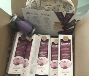 shipping box of Derma E Tinted Moisturizing BB Cream open to show the boxes/tube and pouch and blending sponge