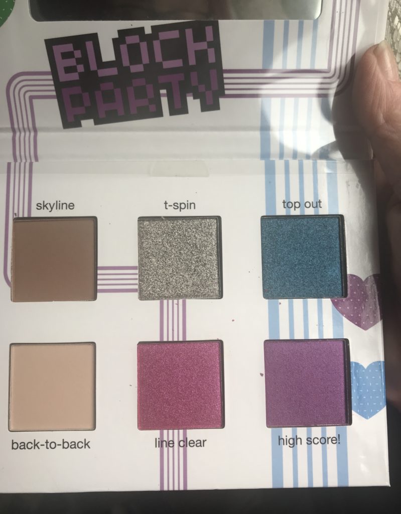 the shadow pans inside the limited edition TETRIS x Ipsy eye shadow palette