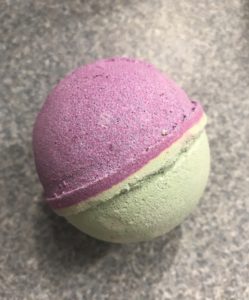 purple and green bath bomb from Warfighter Hemp