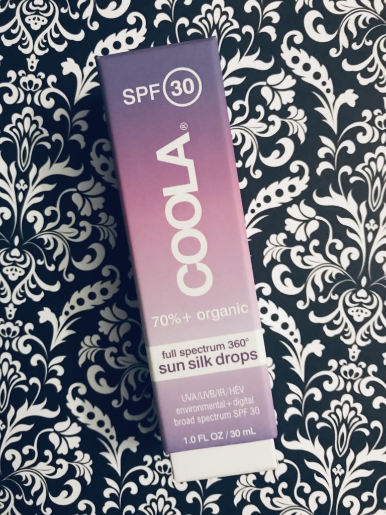 sturdy outer box to protect the glass bottle Coola Sun Silk Drops SPF 30