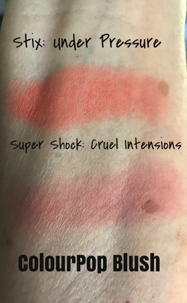 labeled swatches of two different blush shades from ColourPop, a salmon shade and a rose shade