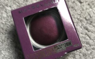 outer packaging of Maybelline Color Tattoo, deep purple shade called Knockout