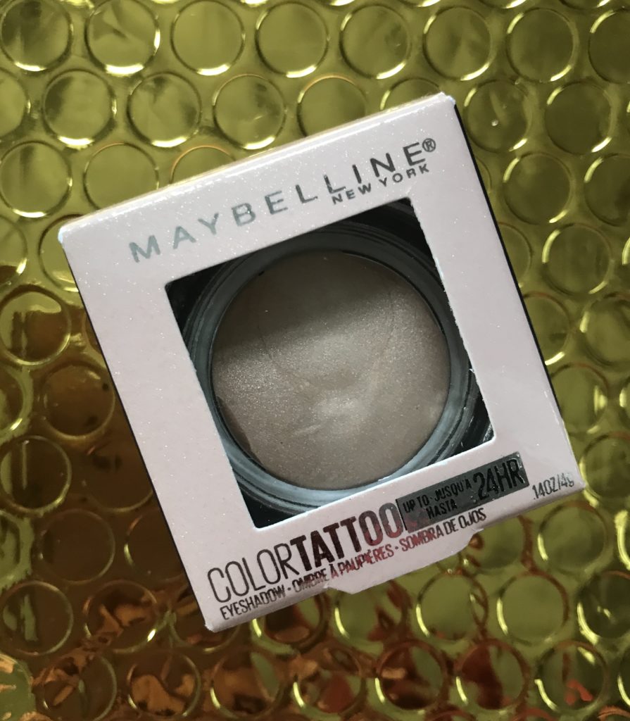 eyeshadow Maybelline Color Tattoo shade Frontrunner, a champagne shade, in its outer packaging