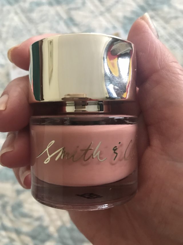 bottle of pink/mauve/nude nail polish from Smith & Cult in a stylish bottle