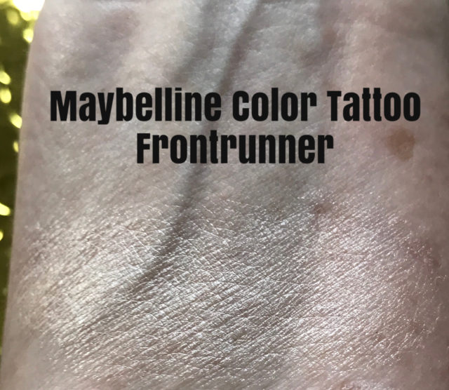 swatch on my arm of champagne eyeshadow shade, Frontrunner, Maybelline Color Tattoo