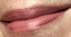 my lips wearing Illamasqua Antimatter Lipstick in pale peachy pink shade, Cosmic