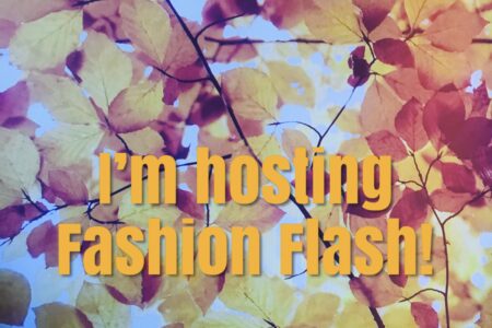 I'm hosting Fashion Flash on a background of fall leaves