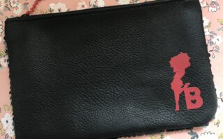 Ipsy Plus Betty Boop makeup bag, black faux leather with red Betty Boop silhouette and letter B