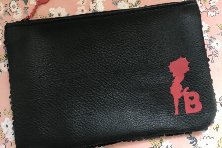 Ipsy Plus Betty Boop makeup bag, black faux leather with red Betty Boop silhouette and letter B