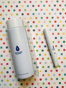 bottle of Luster Neutralizing Cleanser & tube of Whitening Serum part of the Luster Premium White 2 Minute White Kit