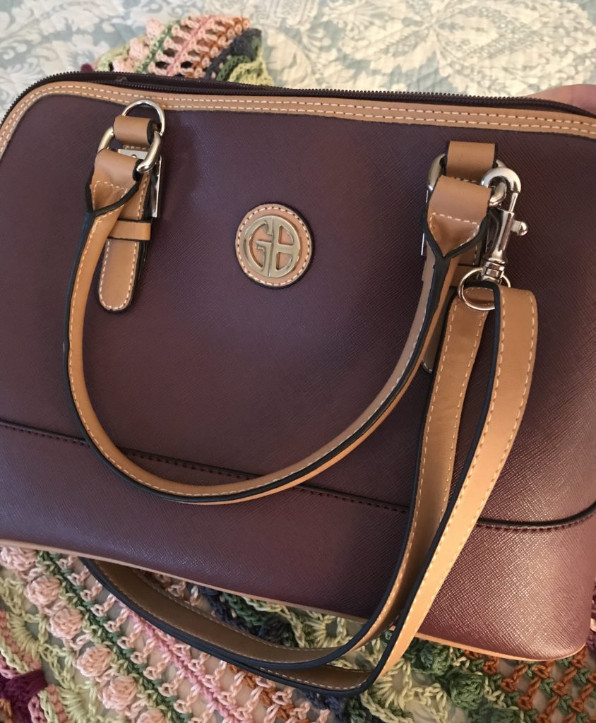 the front of my wine colored Gianni Bernini dome satchel purse