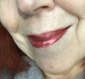 my lips wearing Sephora Cream Lip Shine, in metallic coral shade Frosted Peach