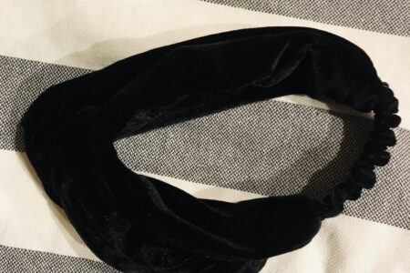 black velvet elasticized headband on striped turkish towel, both gifts with points from Sephora