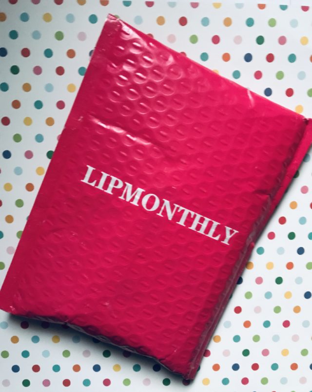 bright pink mailing pouch for Lip Monthly beauty subscription