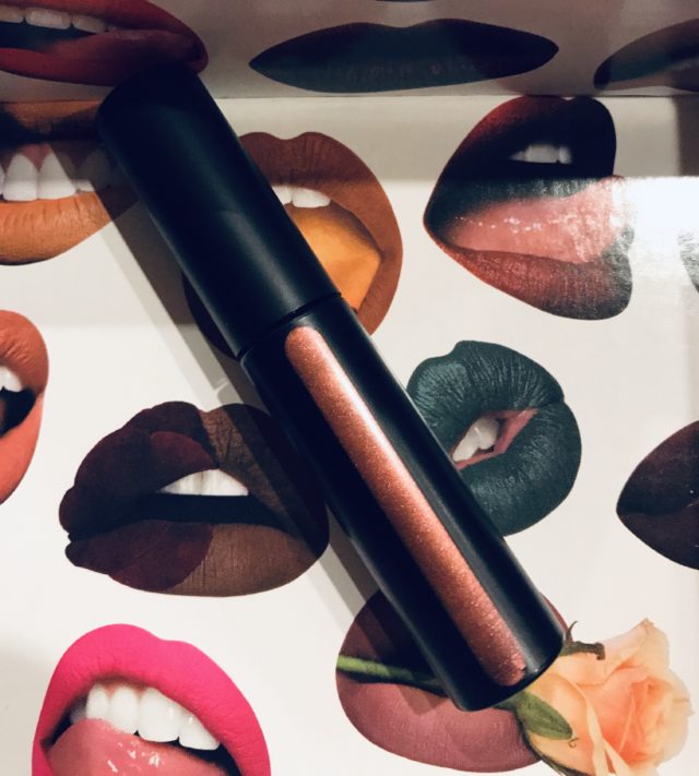 the window in one side of the Melt Metal Gloss tube showing the color of the gloss, Seance, a rose gold