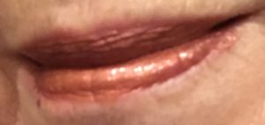 my lips wearing rose gold Seance, a metallic lipgloss Melt Cosmetics Metal Gloss