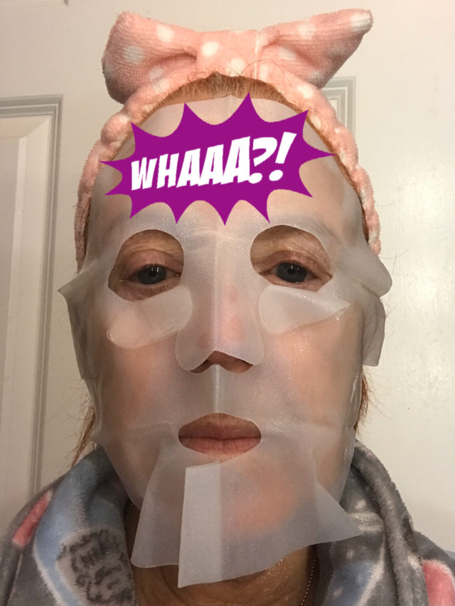 me wearing HydroMask sheet mask and the two protective layers covering the sheet mask, a mistake!