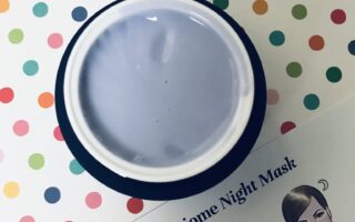 violet colored cream inside the jar of City Beauty MicroBiome Night Mask