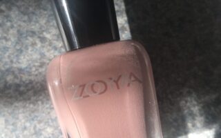 bottle of Zoya Joss nail polish, a pink neutral in the sunshine