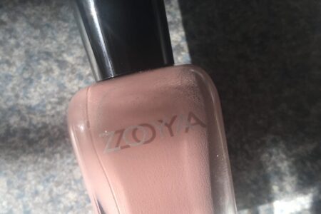 bottle of Zoya Joss nail polish, a pink neutral in the sunshine