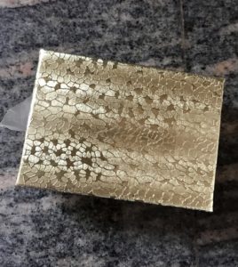small gold paper jewelry-style box