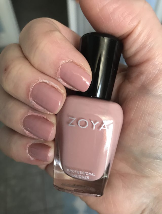 nail swatch with bottle of Zoya Joss, a pale pink/neutral cream polish from Zoya