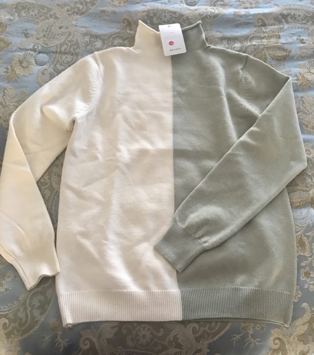 funnel neck off white and sage green sweater