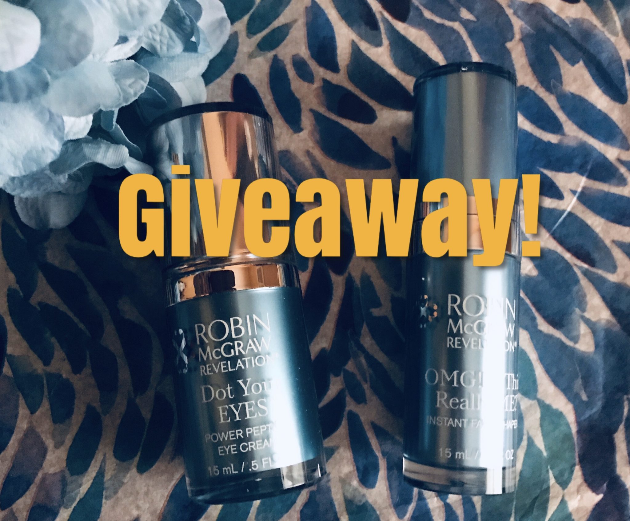 bottles of Robin McGraw Dot Your Eyes Eye Cream & OMG! Is This Really ME? Instant Face Shaper partially covered by the word: Giveaway!