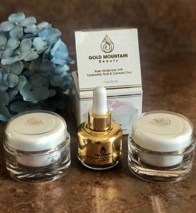 2 jars and one bottle and box from Gold Mountain Beauty skincare