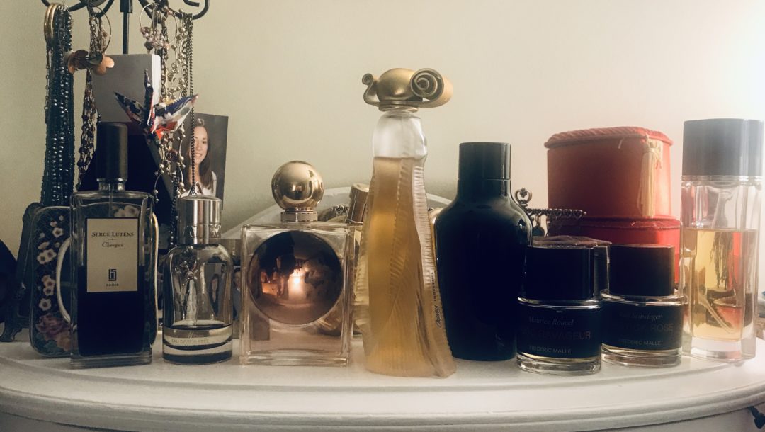 bottles of my perfumes on my dresser