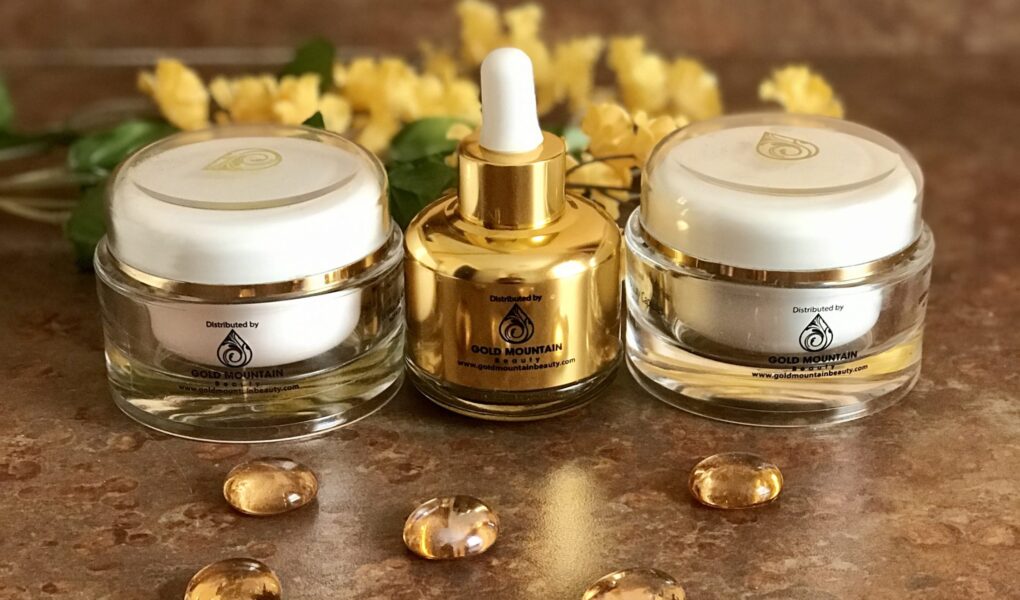 bottle and two jars of skincare products from Gold Mountain Beauty