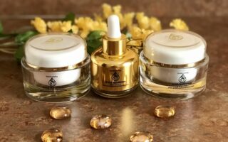 bottle and two jars of skincare products from Gold Mountain Beauty