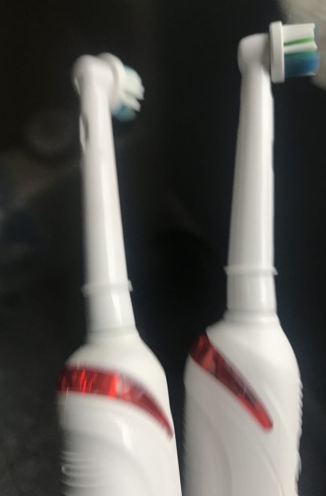 the red pressure sensors that light up on the Oral B Advanced Clean brush handle if too much pressure is exerted