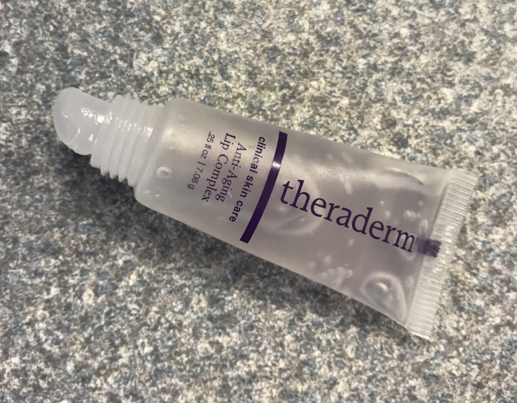 tube of Theraderm Anti-Aging Lip Complex open to show the slant tip applicator