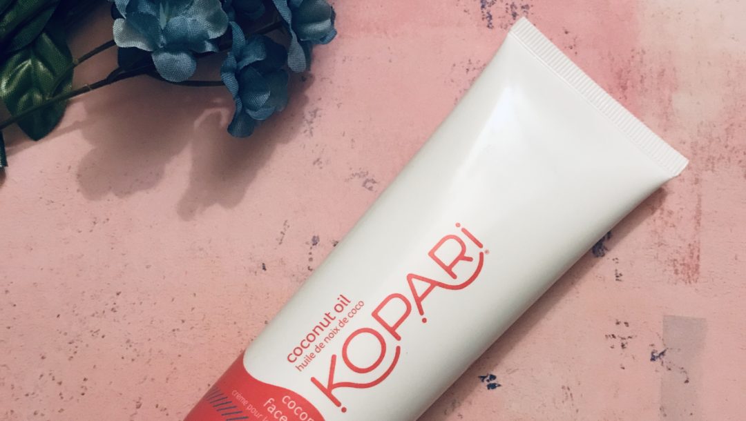 white & red tube of Kopari Coconut Face Cream