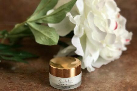 frosted plastic jar with rose gold top of CIREM Cosmetics Jardins des Fleur Rose and Lavender Eye Cream