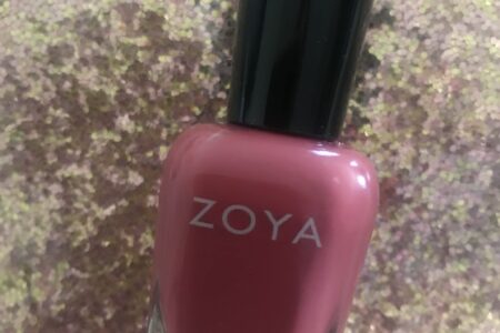 bottle of Zoya "Briar" nail polish, a red terra-cotta cream polish