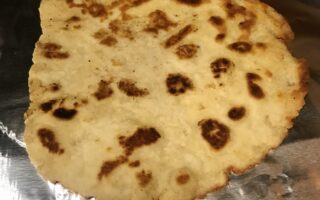 browned flatbread after it came out of the pan