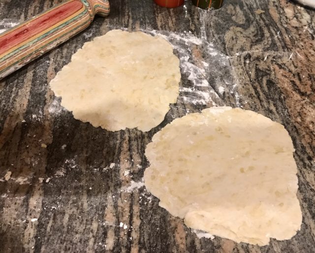 rolled out dough for flatbread