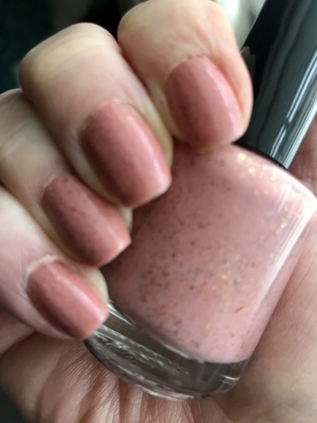my nails wearing pink-mauve Scofflaw nail polish, Leda and the Swan