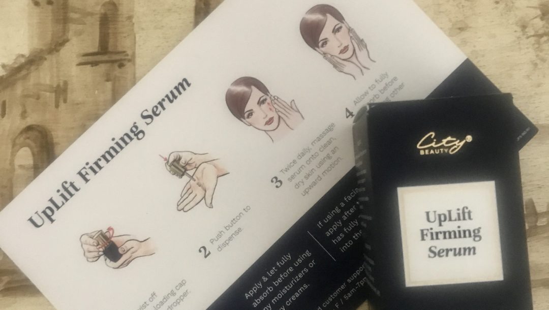 City Beauty UpLift Firming Serum in its outer packaging and product card that explains how to apply it