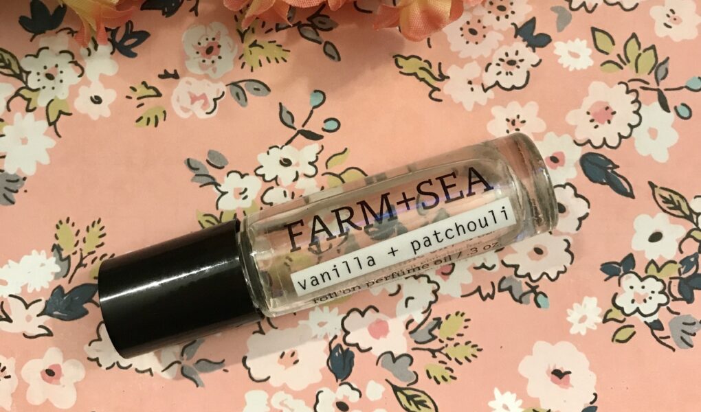 closeup of Farm + Sea Vanilla + Patchouli Roll-on Perfume Oil vial