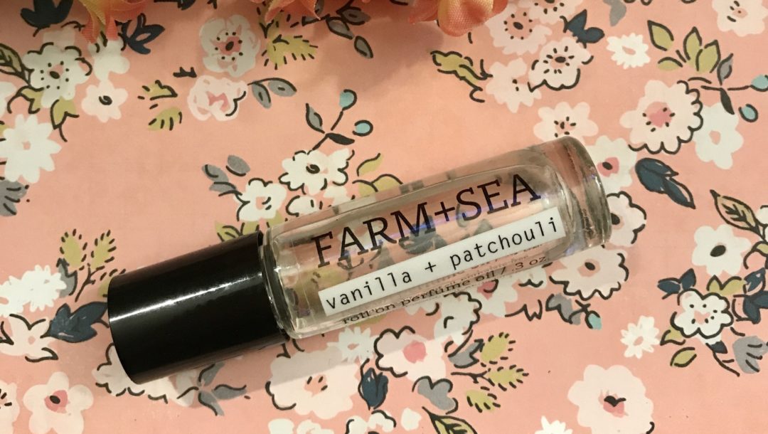 closeup of Farm + Sea Vanilla + Patchouli Roll-on Perfume Oil vial