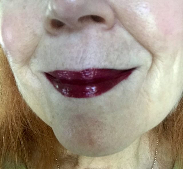 my lips wearing burgundy red lipgloss, Melt Metal Gloss shade Trance