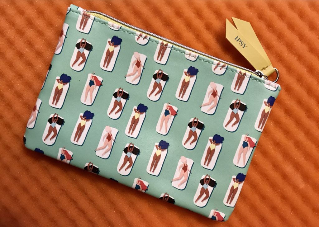 makeup bag adorned with girls on beach towels from the June 2020 Ipsy Glam Bag Plus