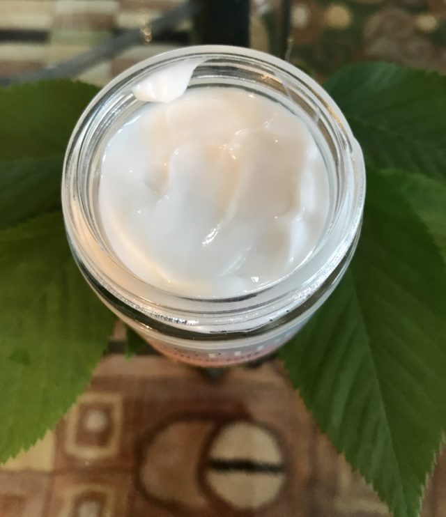 open jar of Ivy & Elder Willow Bark Leave-In Hair Mask showing the thick, white cream