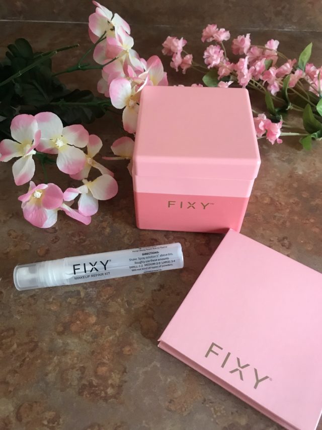 FIXY Makeup Creation & Repair Kit cube containing tools, fixative spray vial and small magnetic palette