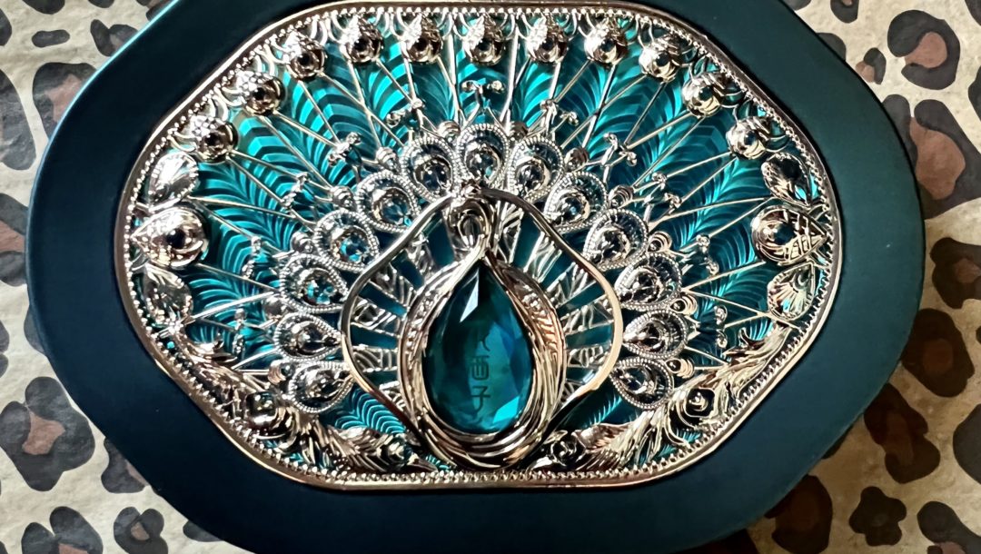 Florasis Impression of Dai Palette case in the shape of a jeweled peacock
