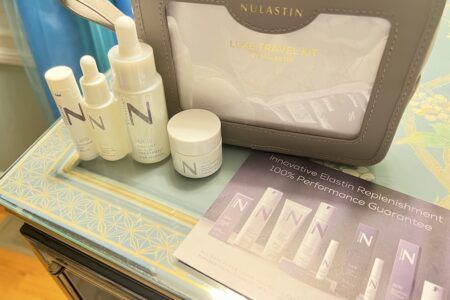 Nulastin Luxe Travel Kit products, info card and case